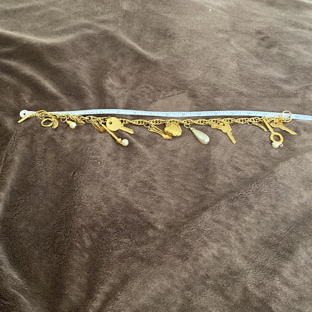Vintage 1980s Rare Moschino Redwall 15 iconic brand gold charm necklace
